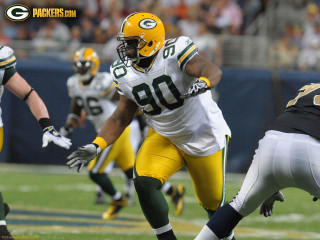 Football player running ball hands - earl moran free wallpaper