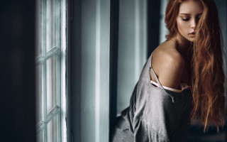 Red haired woman leaning wall - artur tarnowski free wallpaper