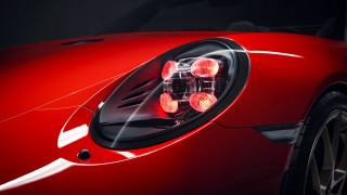 Red sports car headlight black - free neon wallpaper