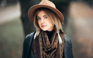 Woman hat scarf park portrait - the background and a tree in the foreground free wallpaper
