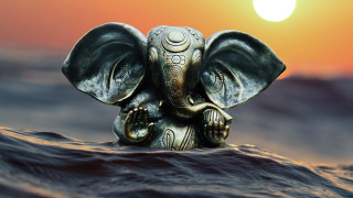 Elephant statue ocean sunset bronze - orange sky free wallpaper