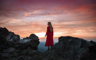 Woman red dress mountain sunset 2 - a pink sky in the background free wallpaper