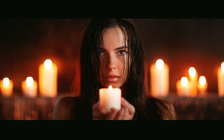Woman candlelit portrait blurry bokeh - candle free wallpaper