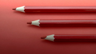 Three pencils red background minimalism - a red surface free wallpaper