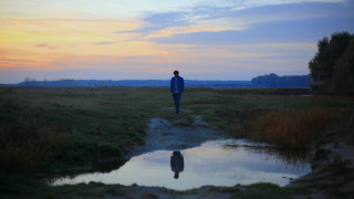 Man path puddle reflection sunset - cedric seaut keos masons free wallpaper