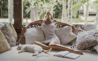 Woman cat book couch pool - a pool in the background free wallpaper