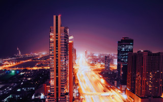 Tokyo night cityscape traffic tower - the background and a street light in the foreground free wallpaper