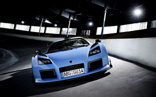 Blue sports car parking garage 3 - art deco free wallpaper