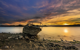 Boat beach ocean sunset clouds - a sky free wallpaper for desktop