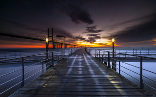 Sunset pier cityscape mountain ocean - a long pier free wallpaper