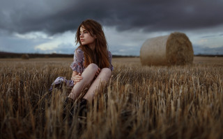Woman field wheat bale cloudy - a cloudy sky free wallpaper for desktop