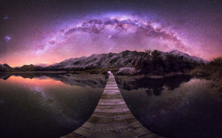 Wooden dock night sky mountains - a wooden dock free wallpaper
