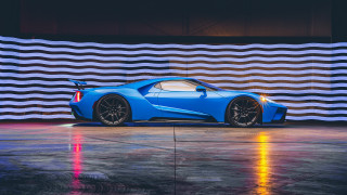 Blue sports car american flag 2 - a wet surface free wallpaper