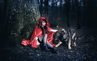 Woman red cloak dog woods - a dog free wallpaper