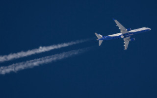 Blue jet flying sky smoke - free airplane wallpaper