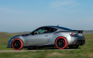 Silver sports car driving grass - silver free wallpaper