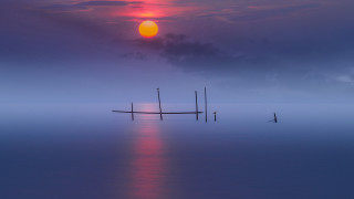 Boat water sunset cloudy sky 4 - water under a cloudy sky free wallpaper