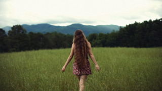Woman field mountains longhair nature - the background in the distance free wallpaper
