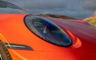 Red sports car cloudy sky 9 - grassy free wallpaper for desktop