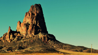 Mountain rock formation telephone pole - a large mountain free wallpaper