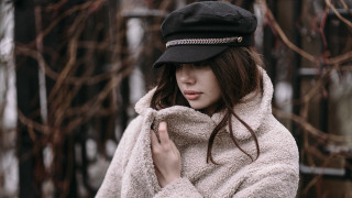Woman coat hat snow blurry - soft detail free wallpaper