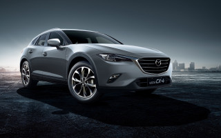 Silver car parking lot city - a silver car free wallpaper