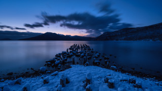 Snowy pier mountains night clouds - a long pier free wallpaper