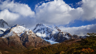 Mountain snow clouds trees horizon - a mountain range free wallpaper
