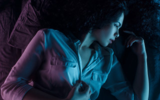 Woman bed relaxing blackhair jacket - free neon wallpaper for desktop