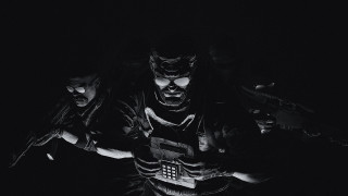 Man holding cellphone gun gloves - his hand and a gun free wallpaper