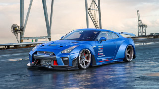 Blue sports car bridge water 2 - a wet road next free wallpaper