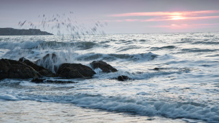 Wave shore lighthouse sunset pink - a lighthouse in the distance free wallpaper