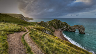 Beach path large rock formation - a large rock formation free wallpaper for desktop