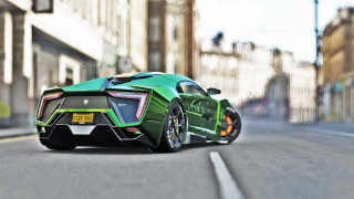 Green sports car city street 5 - a green sports car free wallpaper
