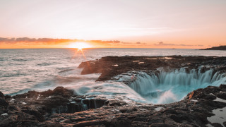 Sunset ocean rocks lake mountain - adrian zingg free wallpaper