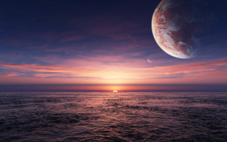 Sunset ocean large object distant - a sunset over the ocean free wallpaper