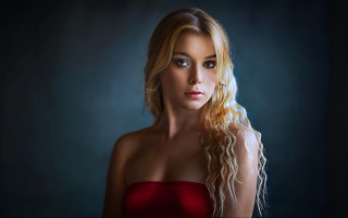 Blonde woman red dress portrait 2 - a black background free wallpaper for desktop