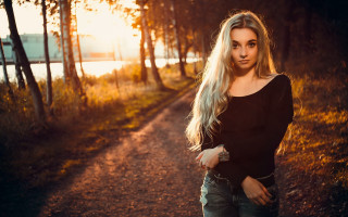 Woman forest dirt road autumn - tree and water free wallpaper
