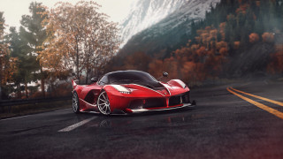 Red sports car mountains autumn - the background and a mountain range in the distance free wallpaper