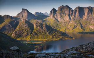 Mountain range lake fantasy landscape - a lake in the foreground and a mountain range in the background free wallpaper