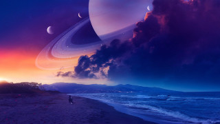 Beach man saturn planets cloudy - the ocean under a cloudy sky free wallpaper