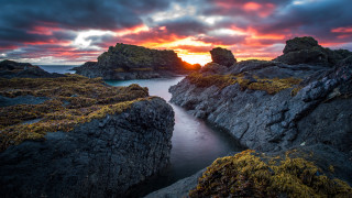 Sunset rocky beach water foreground 7 - a few rock free wallpaper