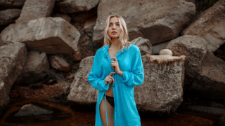 Woman blue robe rocks water - rock and water free wallpaper