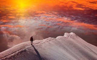 Mountain sunset cloudy sky figure - mountain under a cloudy sky free wallpaper