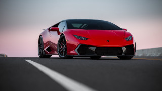 Red sports car dusk pink - a pink sky in the background free wallpaper