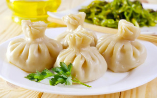 Dumplings plate greens oil background - an zhengwen free wallpaper