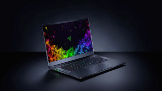 Laptop colorful screen dark surface - a rainbow light free wallpaper