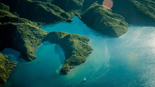 Boat green hills night starry - aerial view free wallpaper for desktop