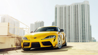 Yellow sports car cityscape 3d - tall building free wallpaper