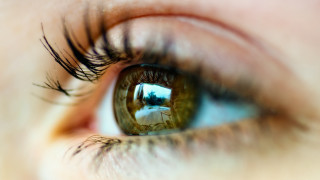Eye reflection building macro photorealism - a close up of a persons eye free wallpaper